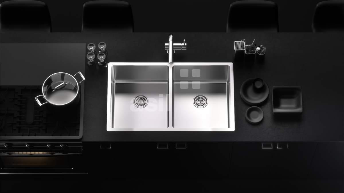 a kitchen sink with a black counter top